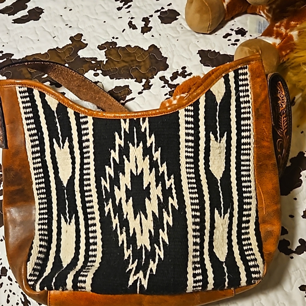 Beautiful  leather  and wool woven handbag. Concealed carry.